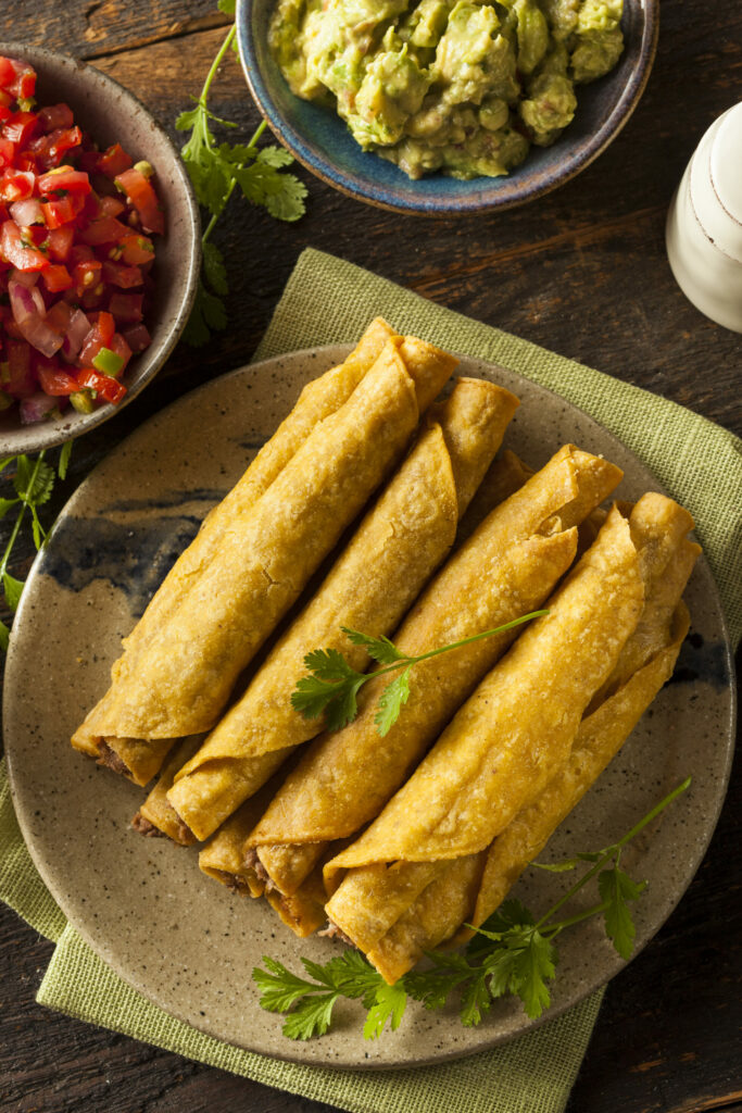 Homemade Mexican Beef Taquitos with Cilantro and Salsa